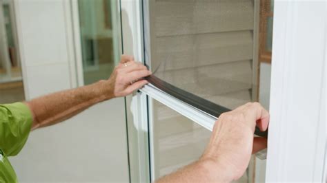 how to lower the window on a storm door